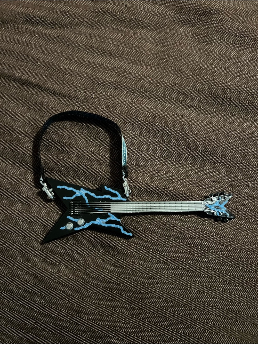Rainbow High Shadow High Uma Vanhoose lightning bolt black and blue guitar